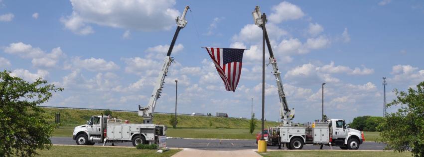 Bucket Trucks with Flag